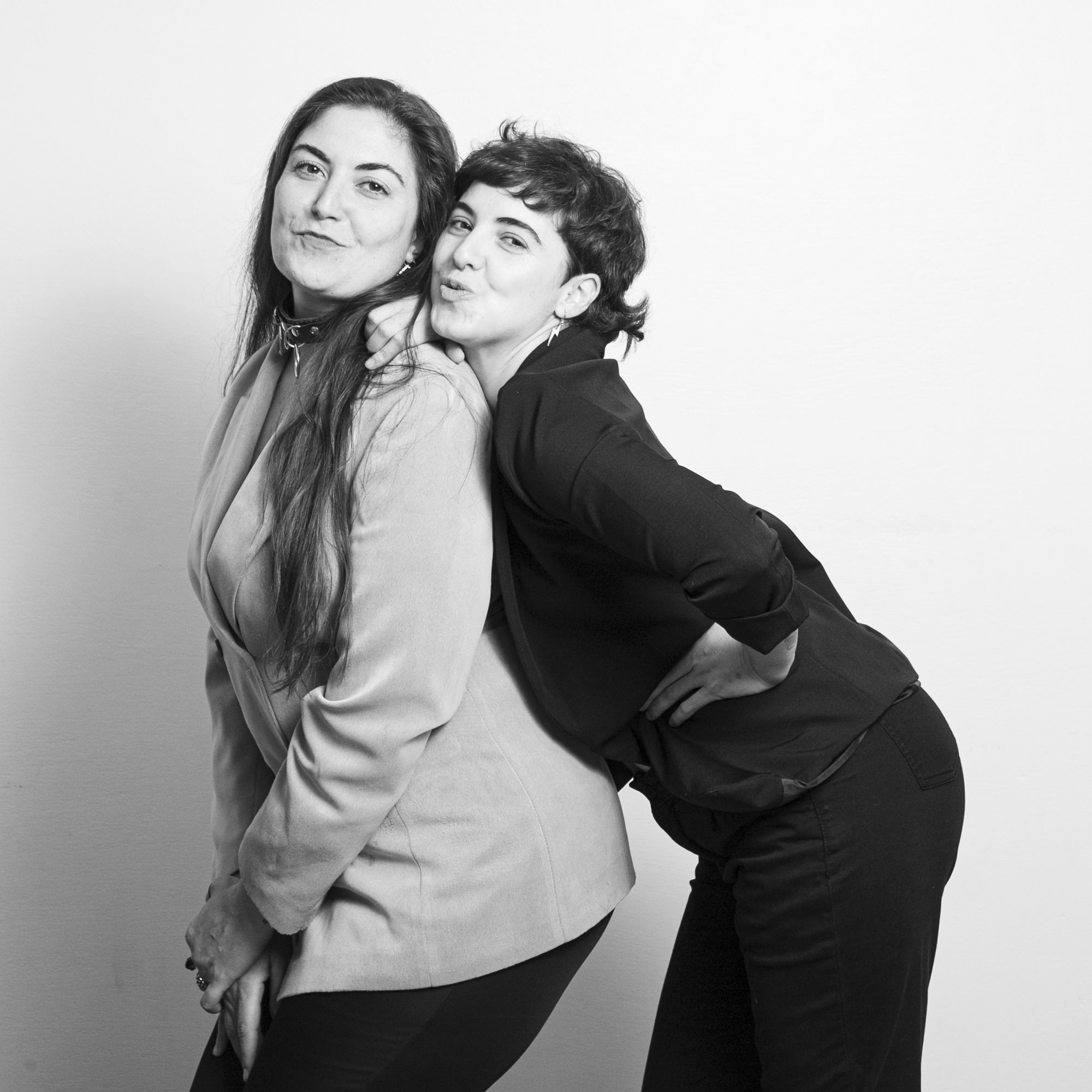 Antro de Lesbianas founders pose playfully.